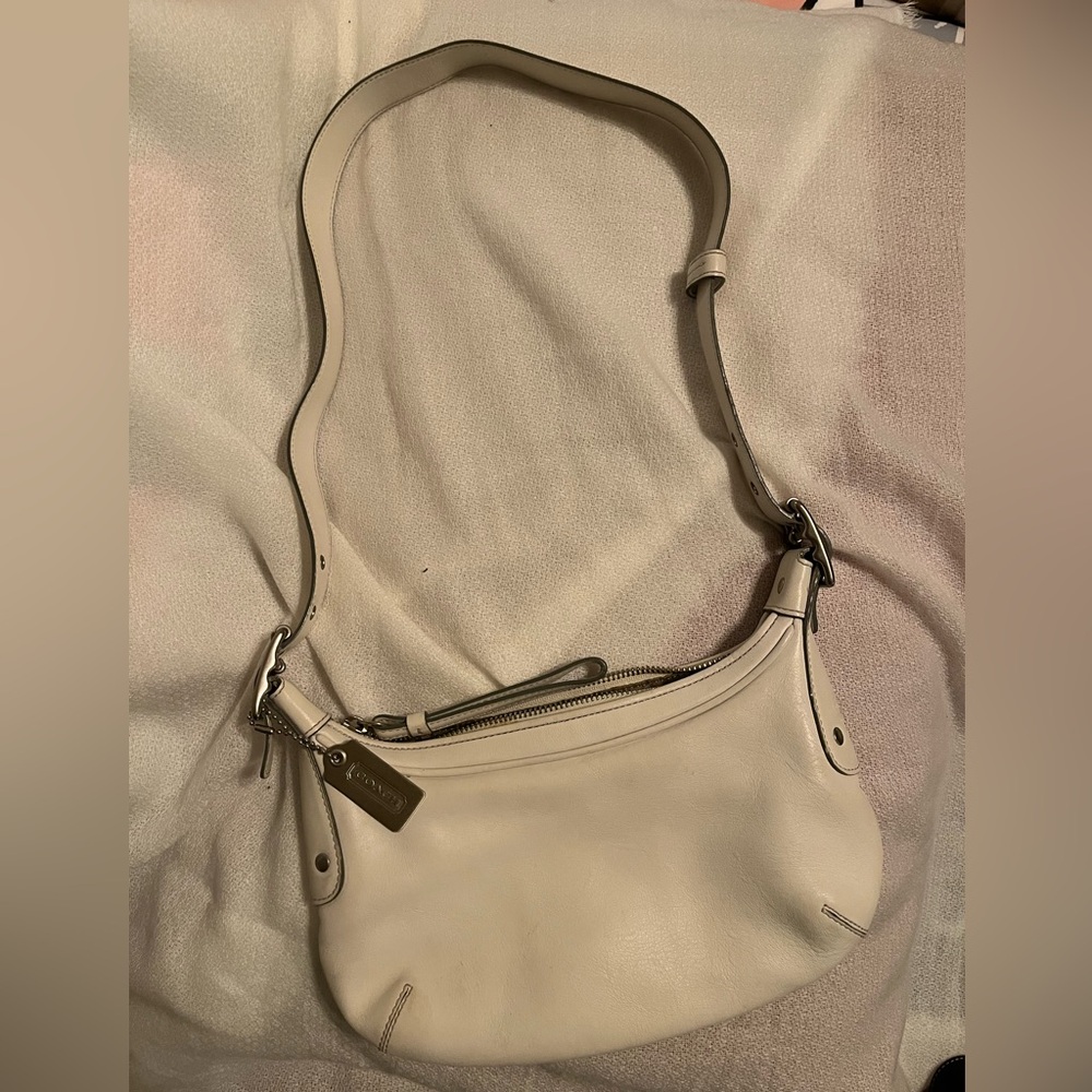 Like new coach with adjustable strap